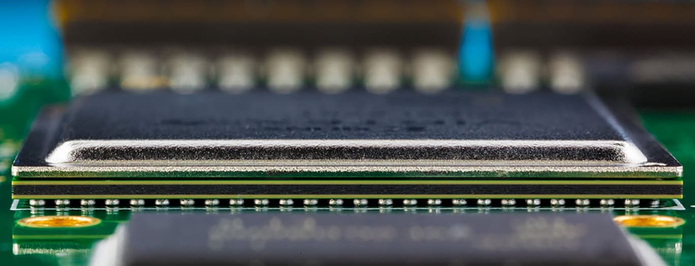 Close-up of a BGA package being assembled on a circuit board
